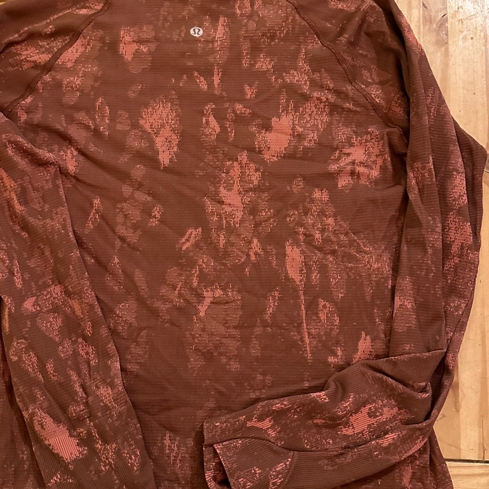 Lululemon shirt with thumb holes. Wore a couple of times.